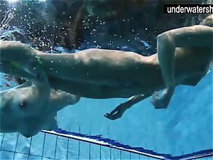two fabulous amateurs showcasing their bods off under water